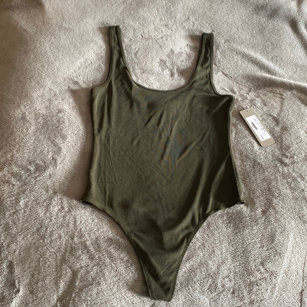 BRAND NEW olive green ribbed body suit. Scoop neck tank, thong style bodysuit.